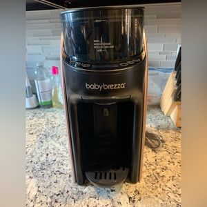 Rose gold baby brezza formula pro. Brand new, never used.